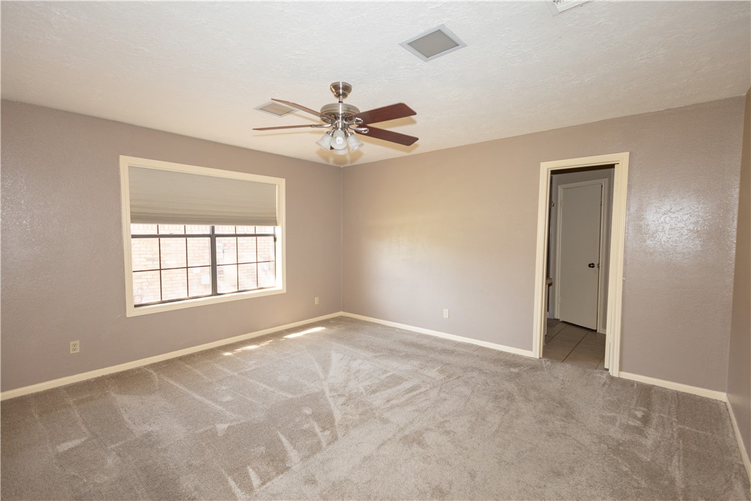 2903 Par Drive Bryan, TX 77802 - Photo 11 of 26 a view of an empty room with a window
