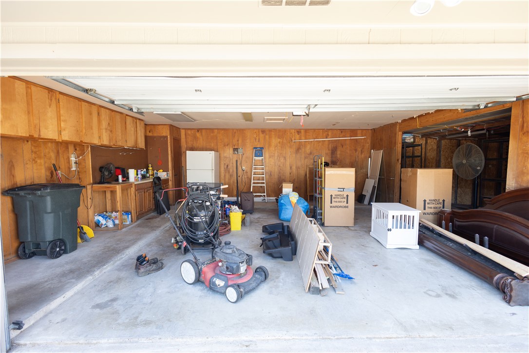 2903 Par Drive Bryan, TX 77802 - Photo 22 of 26 a living room with furniture a flat screen tv and a table