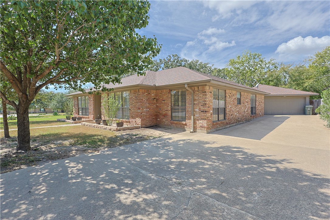 2903 Par Drive Bryan, TX 77802 - Photo 23 of 26 a view of a backyard with large trees