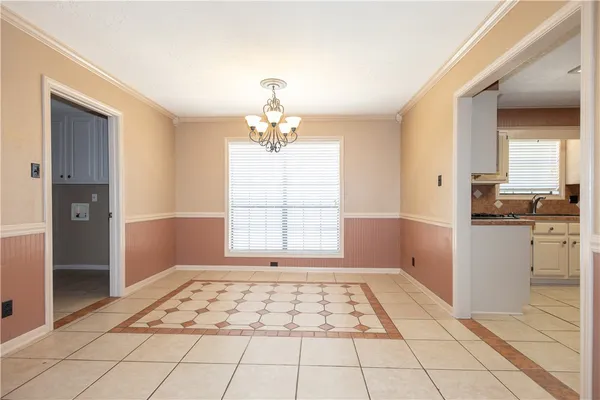 a view of a kitchen with a sink and a window