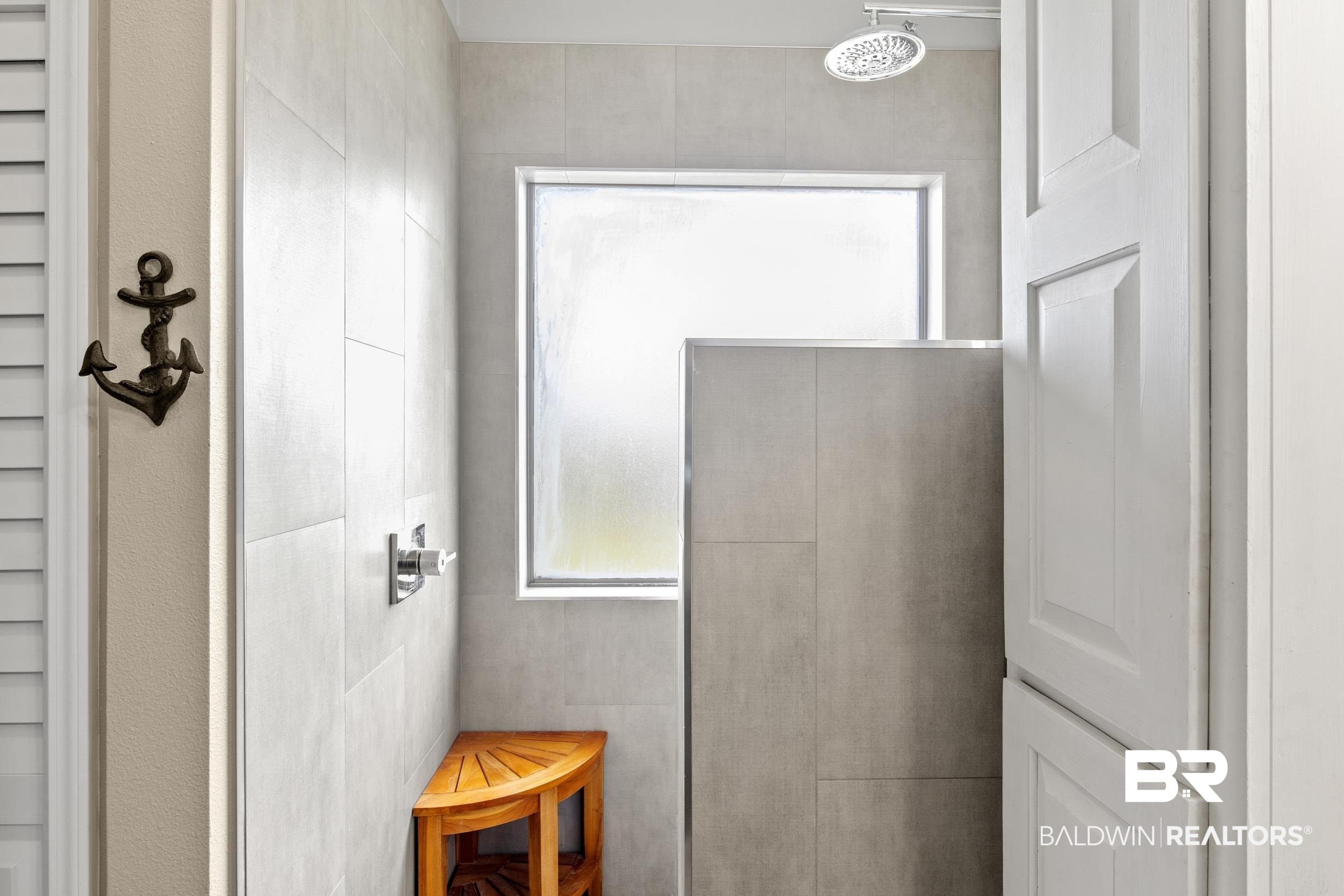 1752 Abbey Loop Foley, AL 36535 - Photo 11 of 21 Bathroom featuring a shower and tile walls