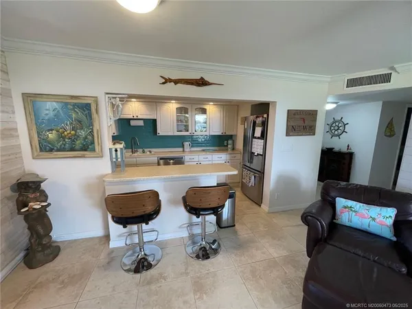 a room with furniture and a chandelier