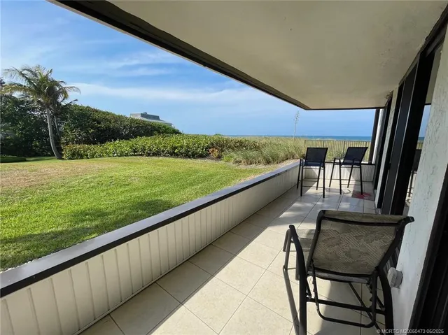 a view of chairs and city view