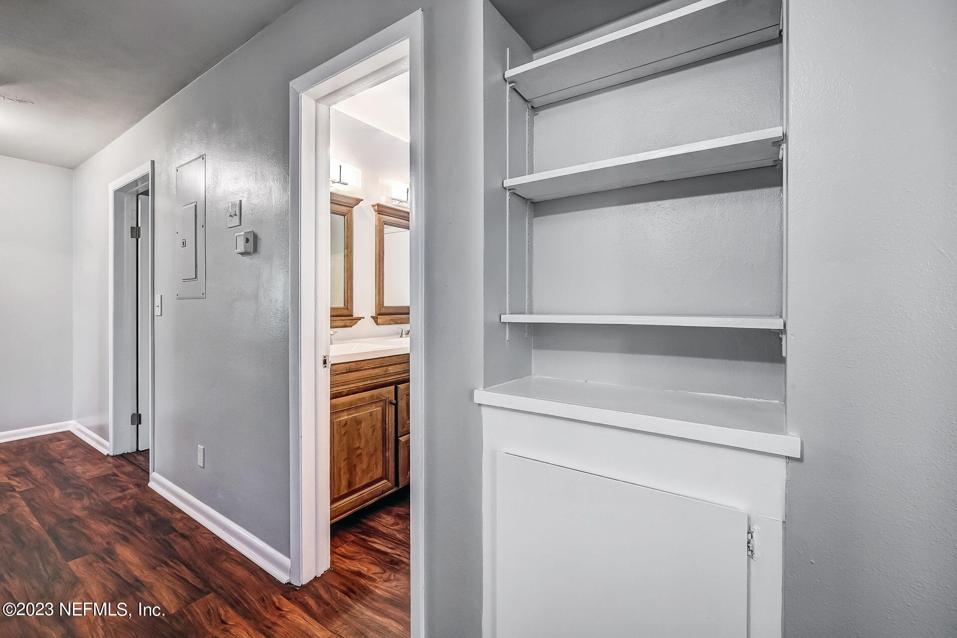 3546 Clyde Drive Jacksonville, FL 32208 - Photo 26 of 50 a view of walk in closet with empty racks
