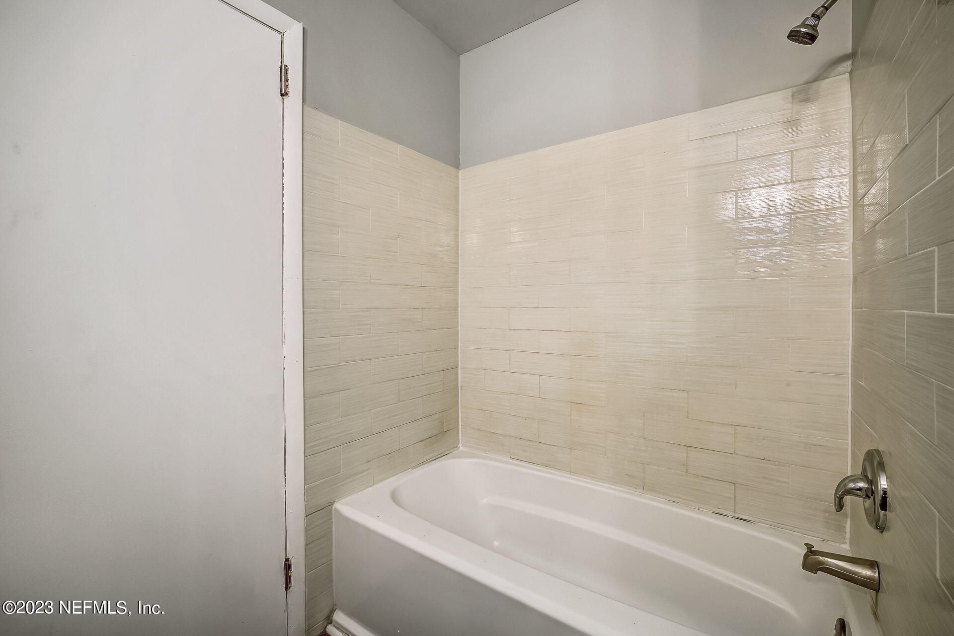 3546 Clyde Drive Jacksonville, FL 32208 - Photo 28 of 50 a bathroom with a bathtub