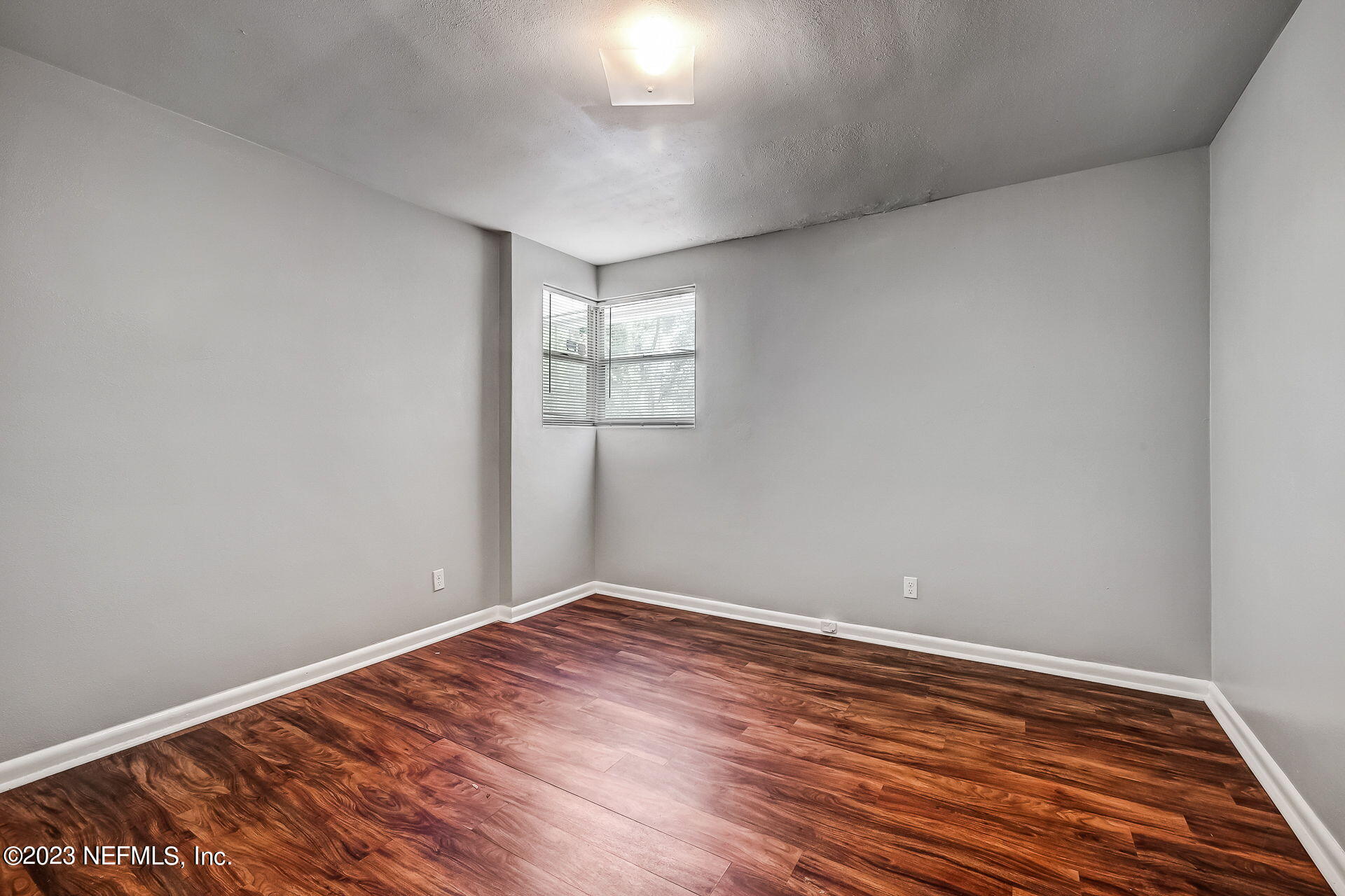 3546 Clyde Drive Jacksonville, FL 32208 - Photo 31 of 50 a view of empty room with wooden floor