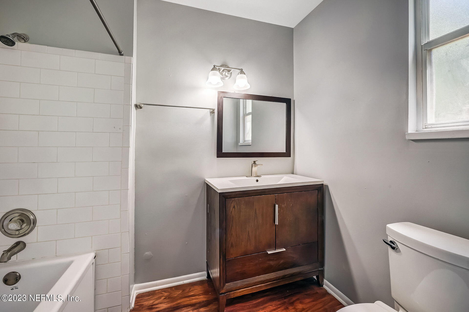 3546 Clyde Drive Jacksonville, FL 32208 - Photo 34 of 50 a bathroom with a sink toilet and vanity