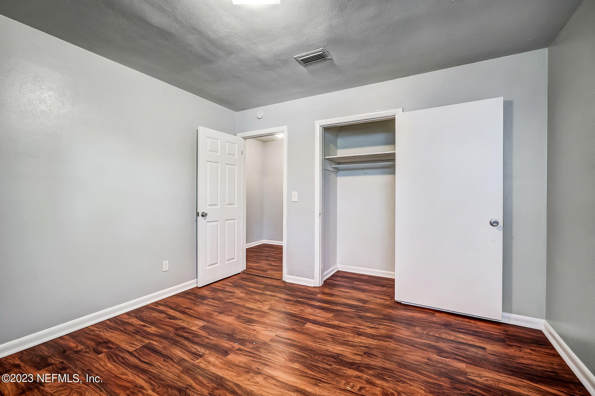 3546 Clyde Drive Jacksonville, FL 32208 - Photo 37 of 50 a view of empty room with wooden floor