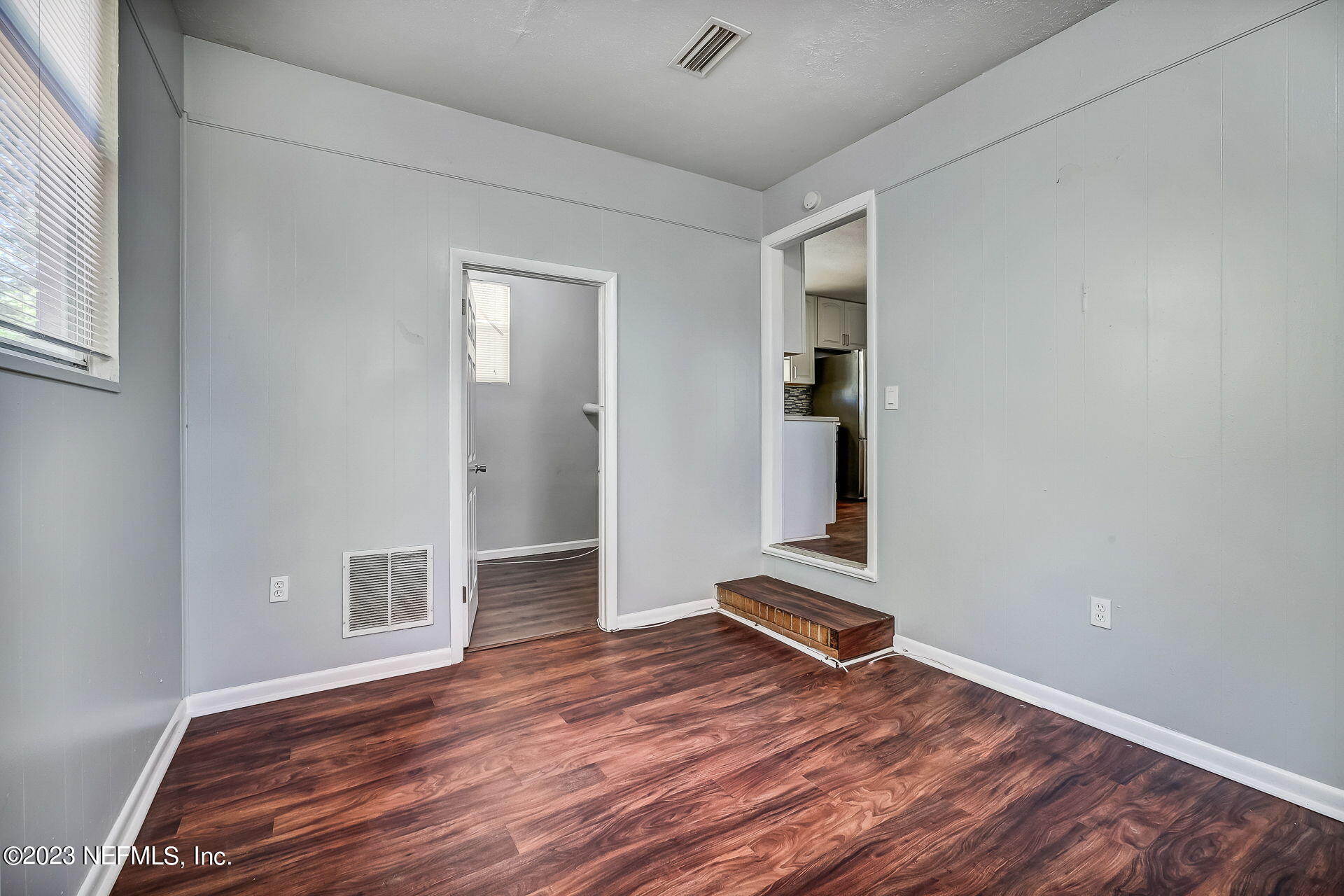 3546 Clyde Drive Jacksonville, FL 32208 - Photo 39 of 50 a view of room with wooden floor