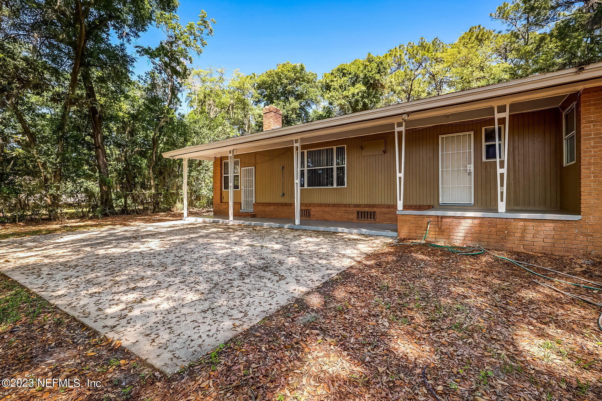 3546 Clyde Drive Jacksonville, FL 32208 - Photo 45 of 50 a house with trees in the background