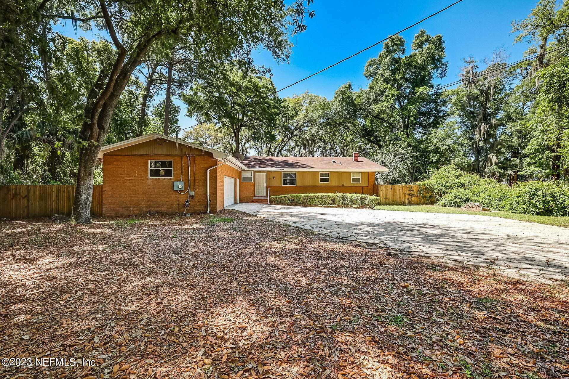 3546 Clyde Drive Jacksonville, FL 32208 - Photo 6 of 50 a view of a house with backyard and garden