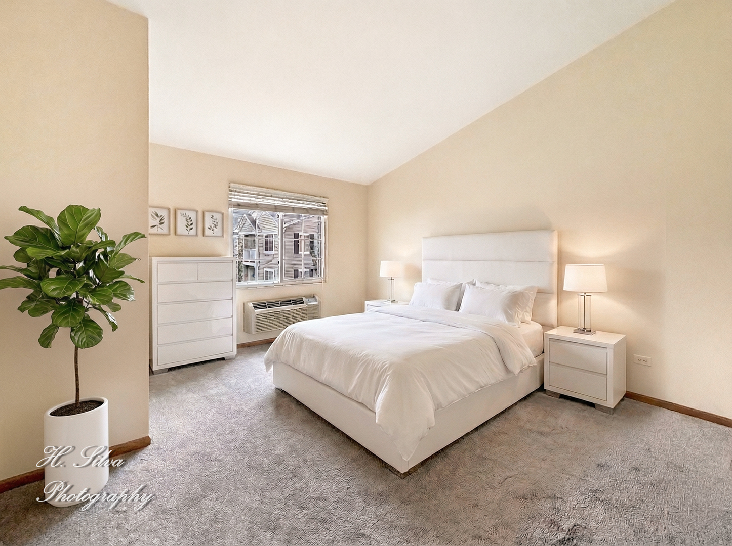 1431 Silverstone Drive, Unit 1431 Carpentersville, IL 60110 - Photo 9 of 18 a bedroom with bed and a potted plant