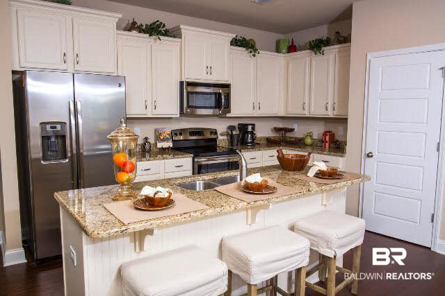 6903 Spaniel Drive, Unit 9C Daphne, AL 36527 - Photo 2 of 14 The SS Refrigerator is included in the purchase price. A washer an dryer also come with this unit! Painted cabinets and granite are featured in this unit as well.