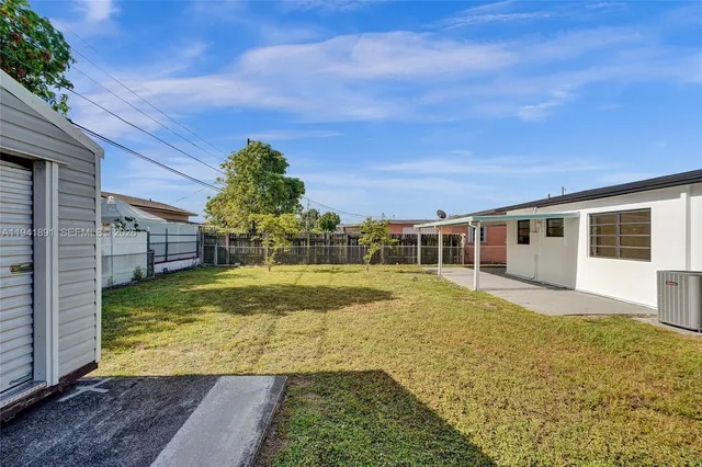 a view of a house with a patio