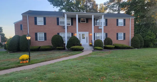 a house view with a garden space