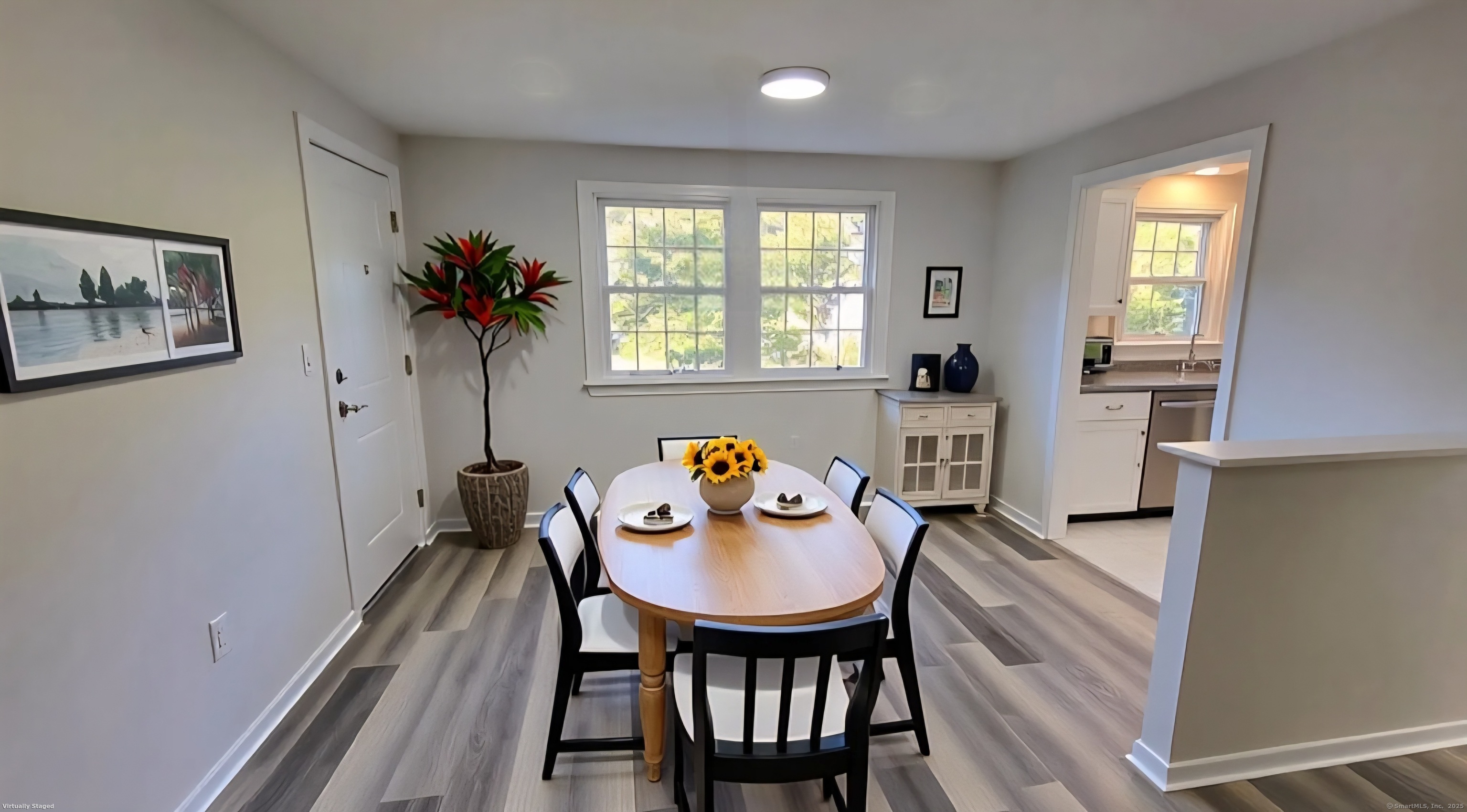 12 Brewster Road, Unit 12B Glastonbury, CT 06033 - Photo 8 of 19 a view of a dining room with furniture and window