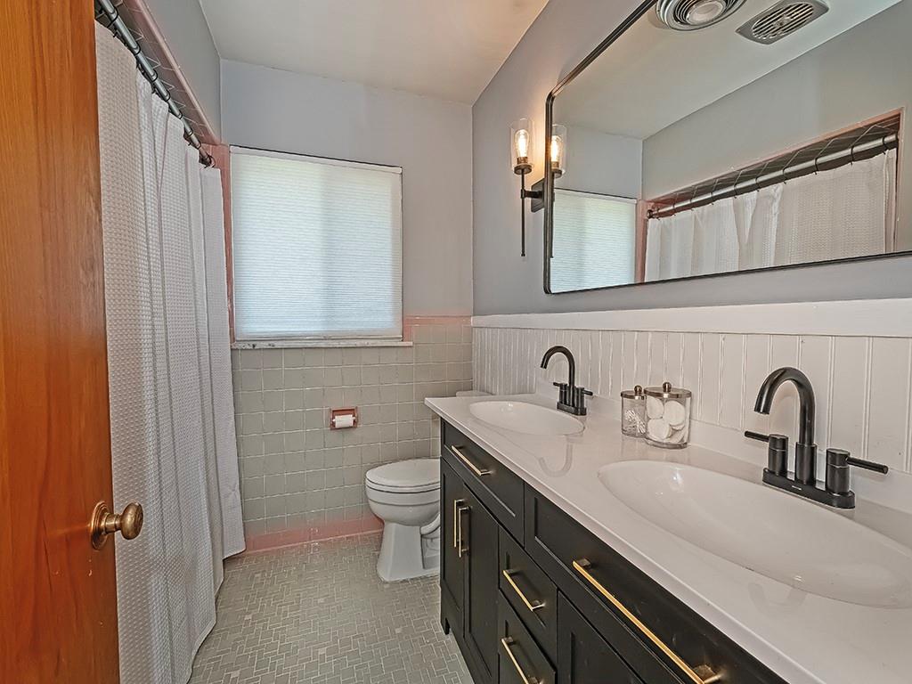 1024 Knollwood Road New Kensington, PA 15068 - Photo 20 of 23 a bathroom with a sink and a mirror