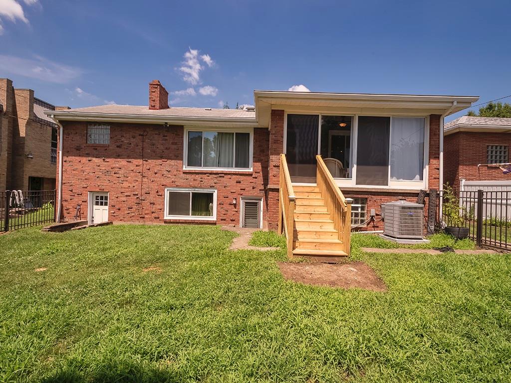 1024 Knollwood Road New Kensington, PA 15068 - Photo 22 of 23 front view of a house with a yard