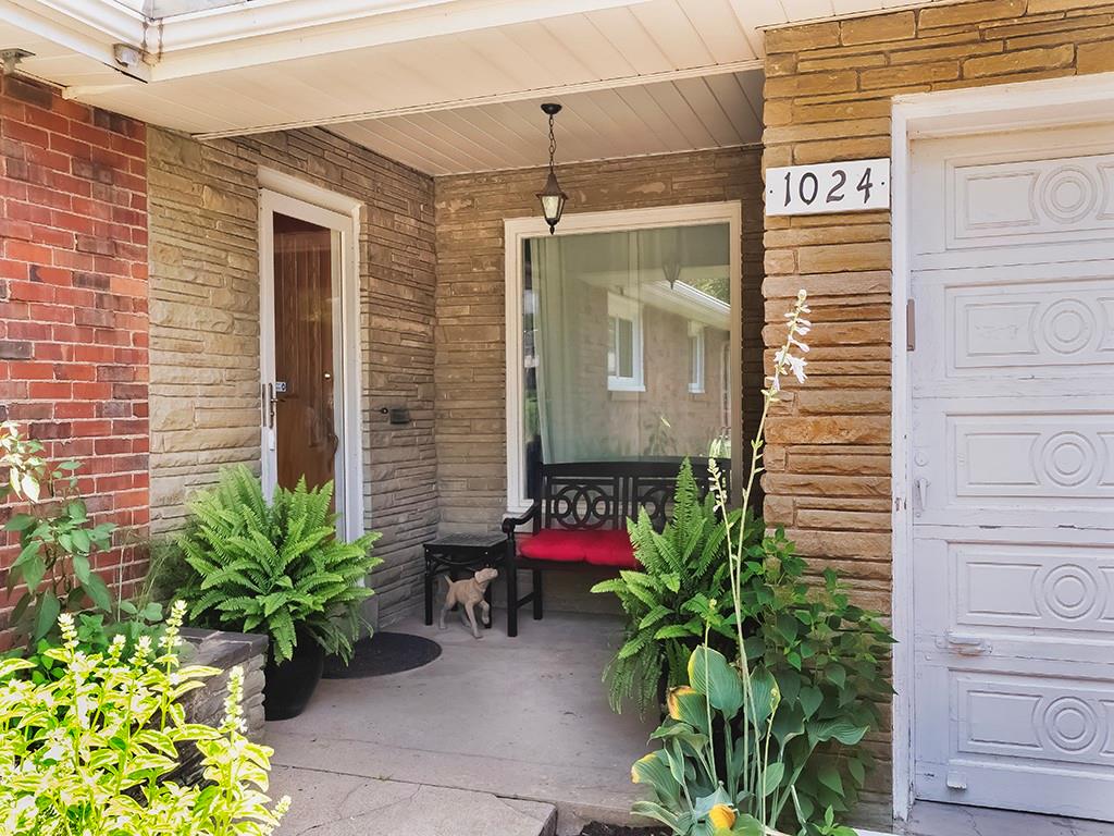 1024 Knollwood Road New Kensington, PA 15068 - Photo 3 of 23 a potted plant sitting in front of a door