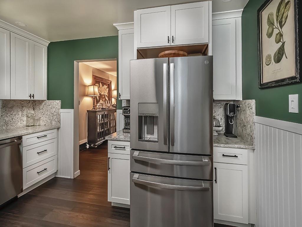 1024 Knollwood Road New Kensington, PA 15068 - Photo 8 of 23 a kitchen with stainless steel appliances a refrigerator stove and cabinets