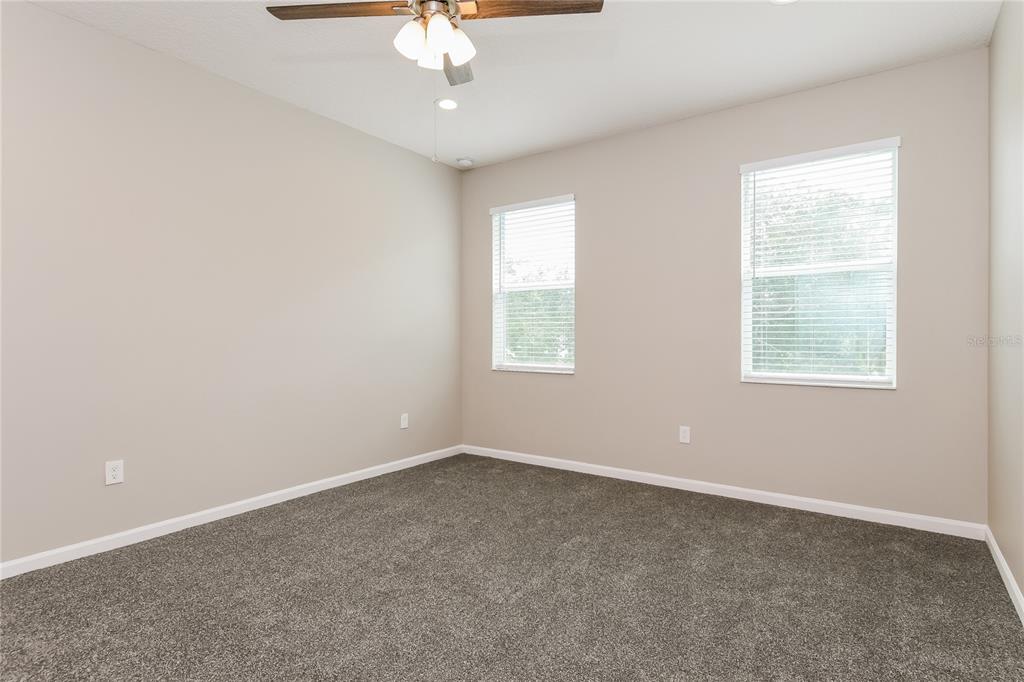 1073 Hendon Loop Davenport, FL 33837 - Photo 9 of 15 an empty room with a window