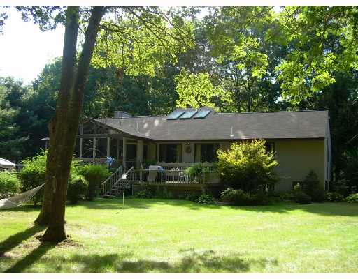320 Grand View Road East Greenwich, RI 02818 - Photo 2 of 4 Exterior Back. SCREENED PORCH & DECK