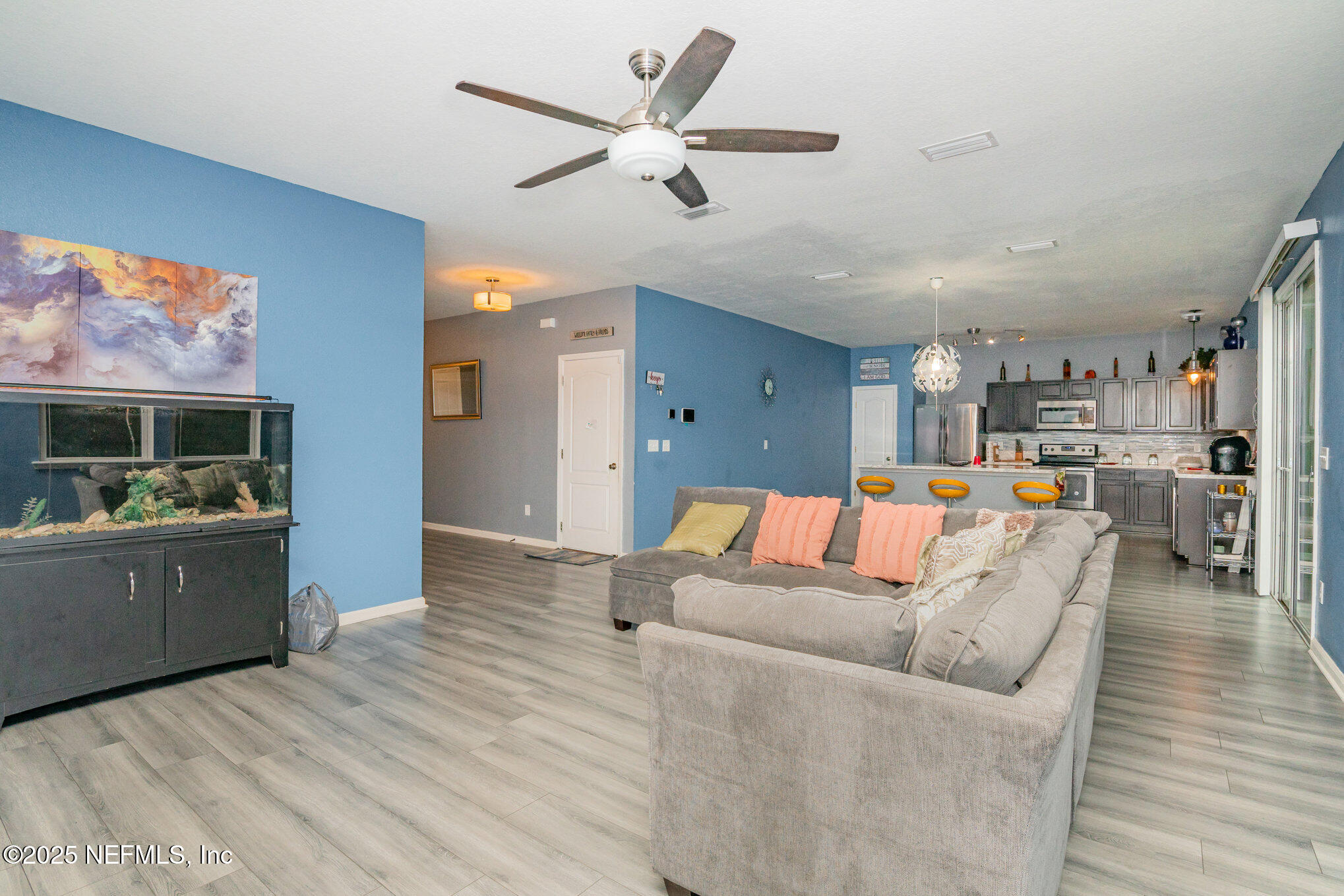 97500 Albatross Drive Yulee, FL 32097 - Photo 11 of 28 a living room with furniture and a kitchen