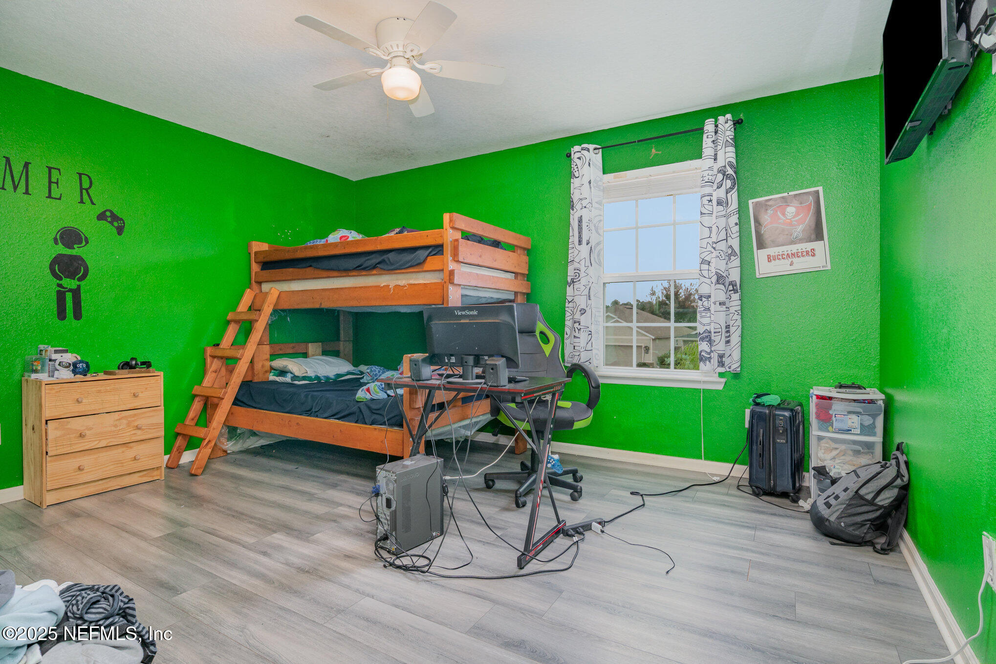 97500 Albatross Drive Yulee, FL 32097 - Photo 15 of 28 a room with furniture and a wooden floor