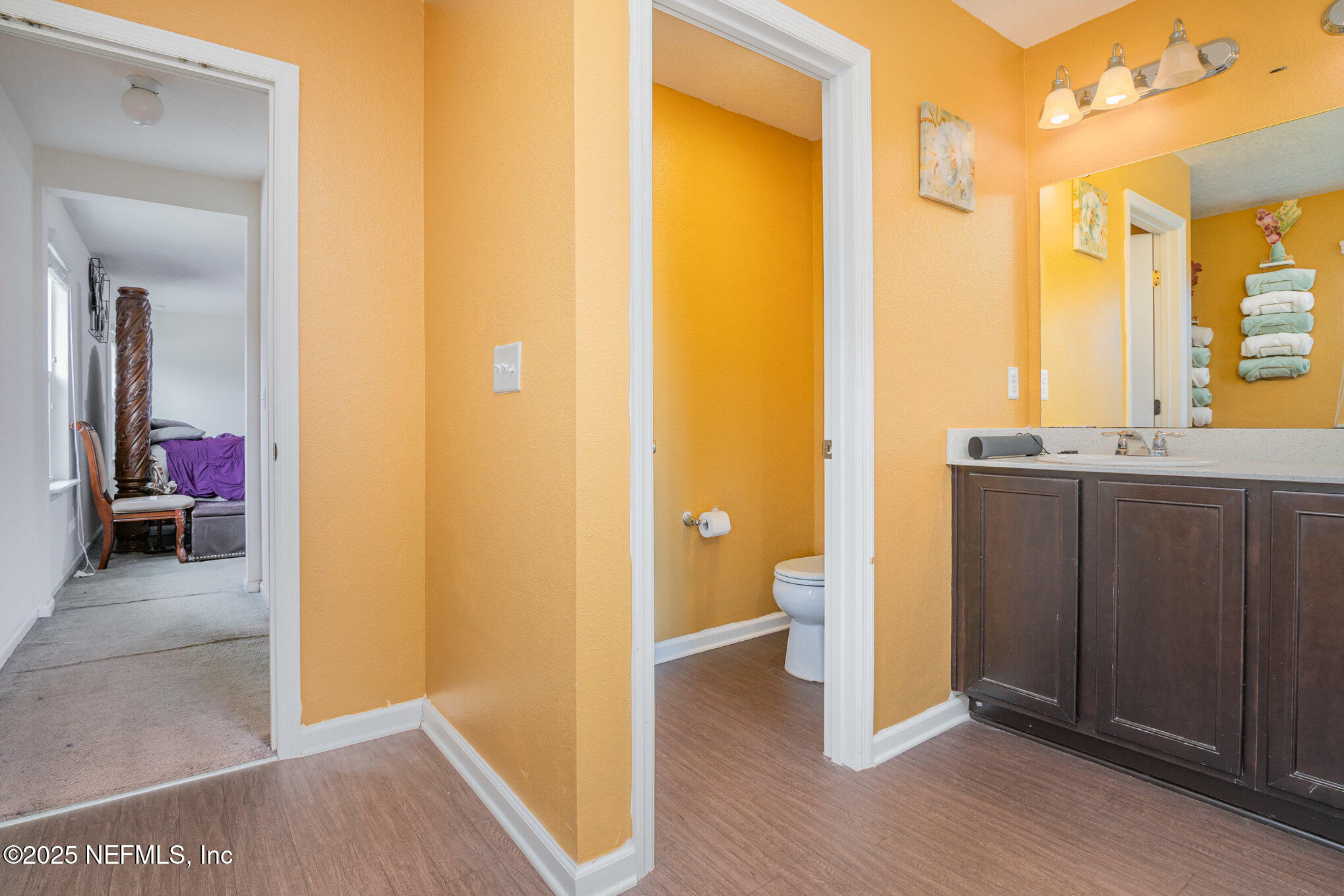 97500 Albatross Drive Yulee, FL 32097 - Photo 17 of 28 a bathroom with a sink and a mirror