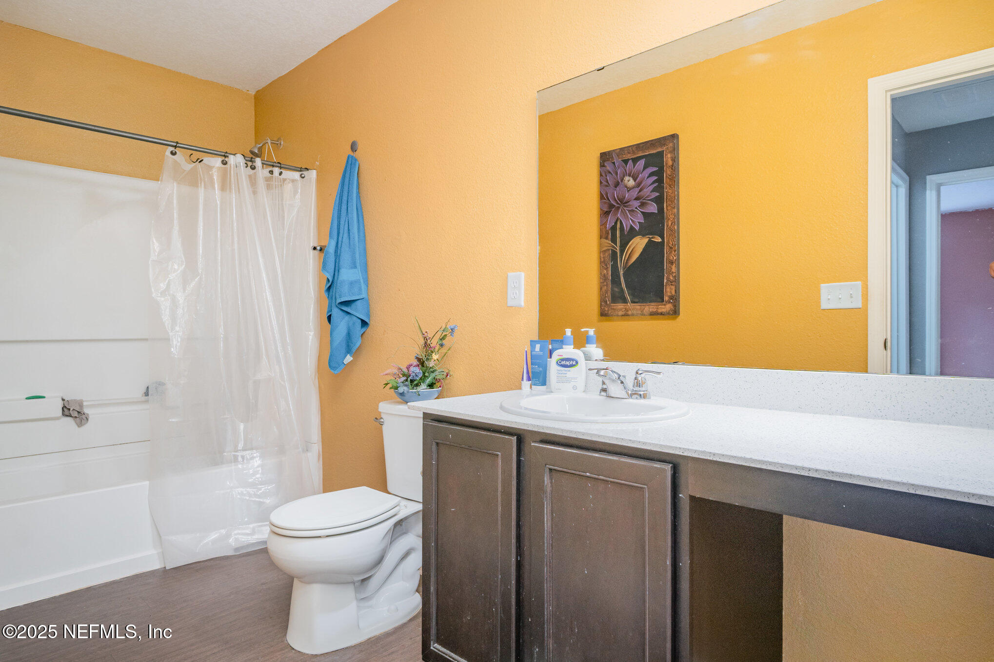 97500 Albatross Drive Yulee, FL 32097 - Photo 22 of 28 a bathroom with a sink a toilet and shower