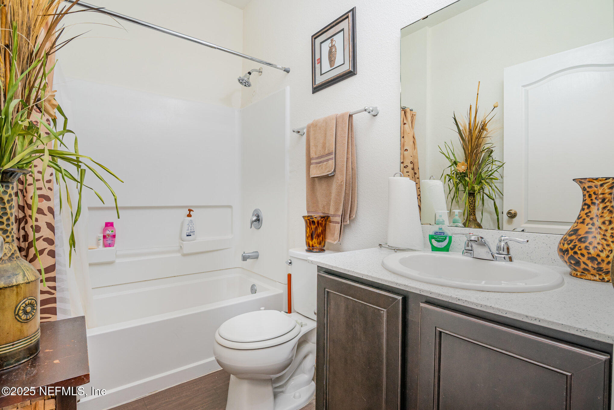 97500 Albatross Drive Yulee, FL 32097 - Photo 26 of 28 a bathroom with a sink a toilet and tub