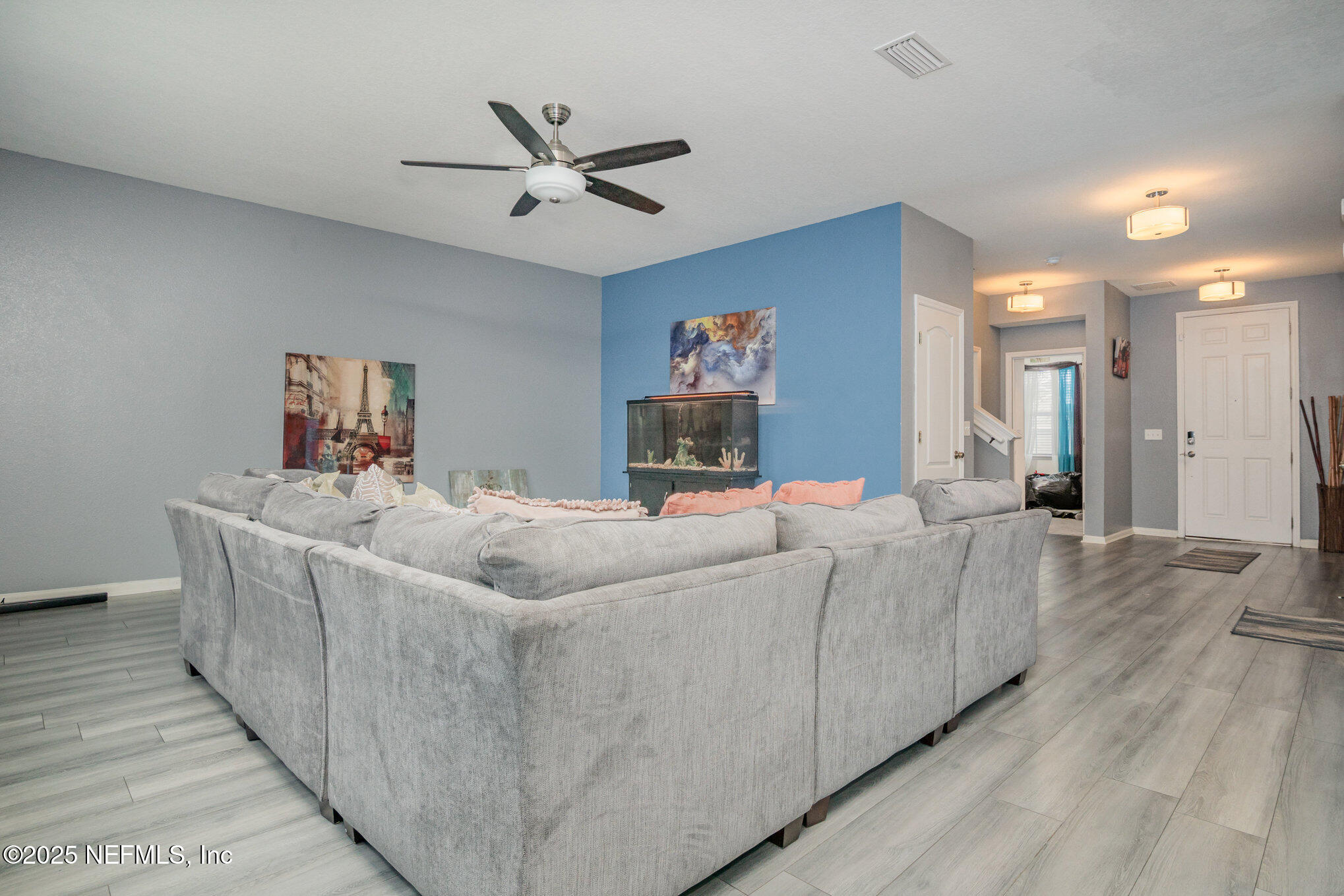 97500 Albatross Drive Yulee, FL 32097 - Photo 5 of 28 a living room with furniture and a wooden floor