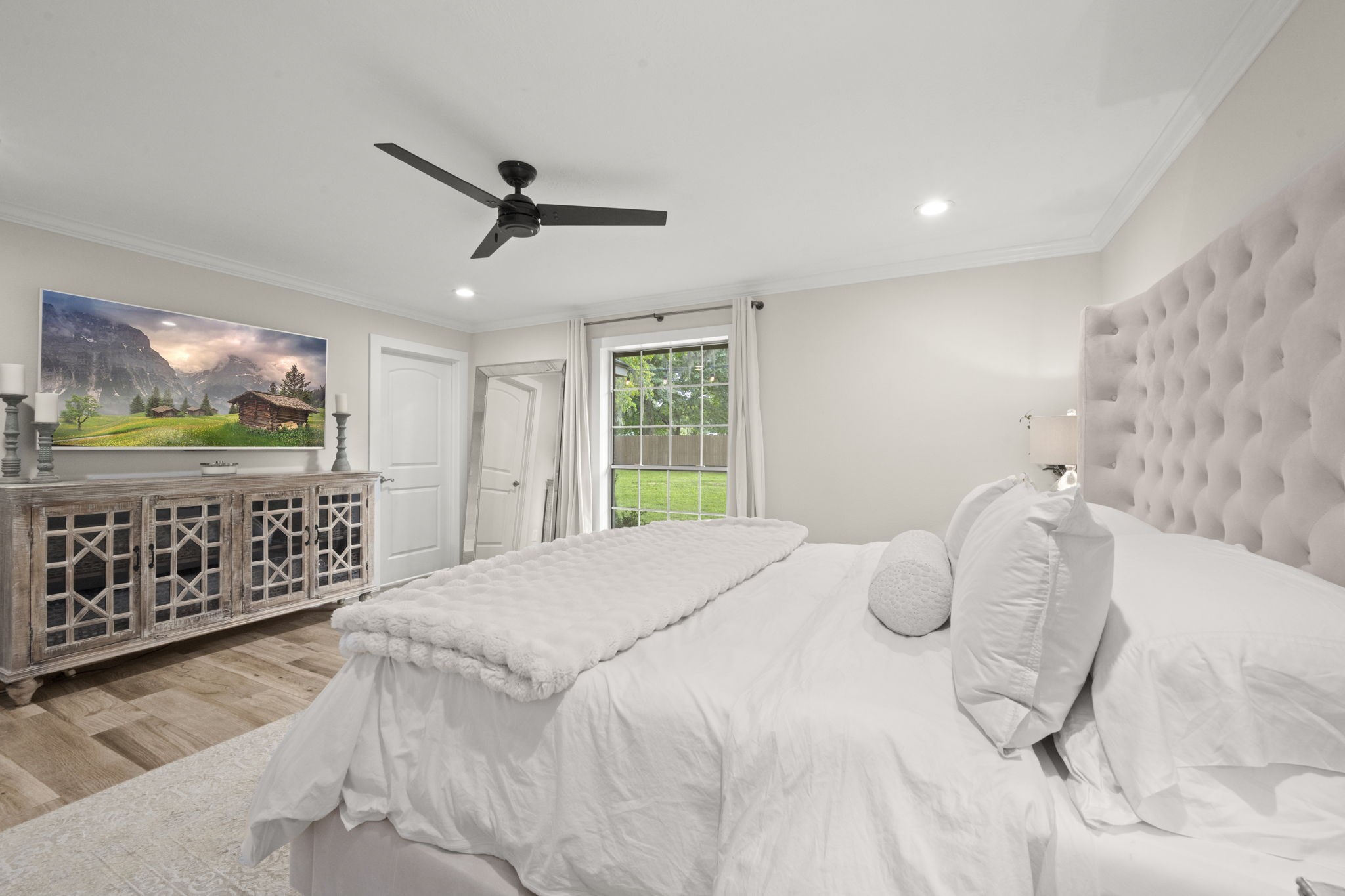 8555 Matthews Lane Magnolia, TX 77354 - Photo 18 of 37 a bedroom with a bed and a window