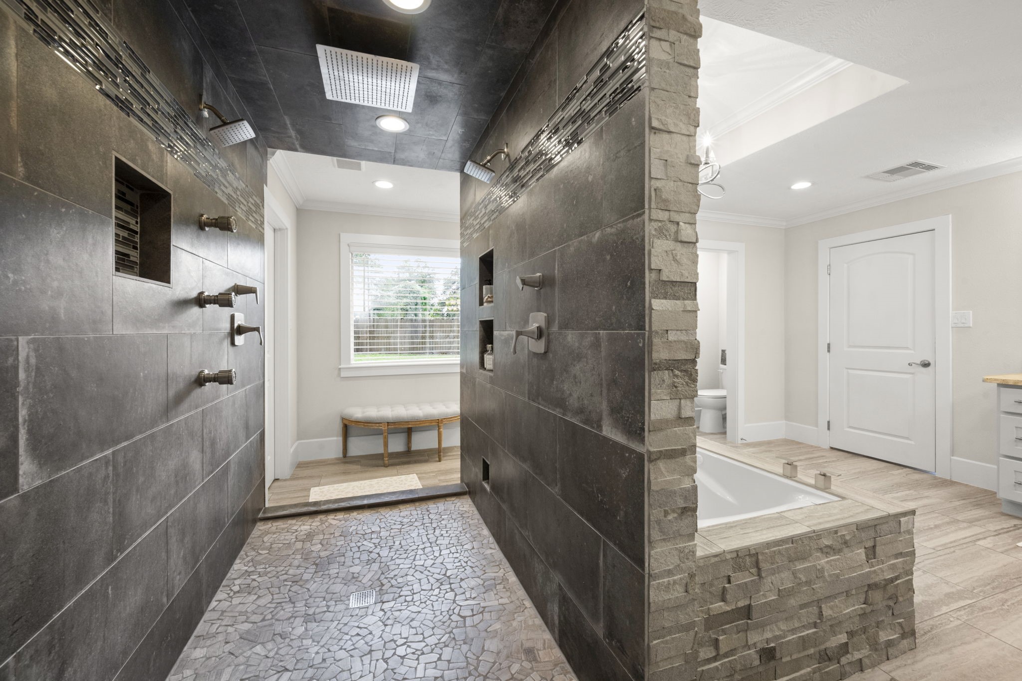 8555 Matthews Lane Magnolia, TX 77354 - Photo 20 of 37 a bathroom with a tub shower and sink