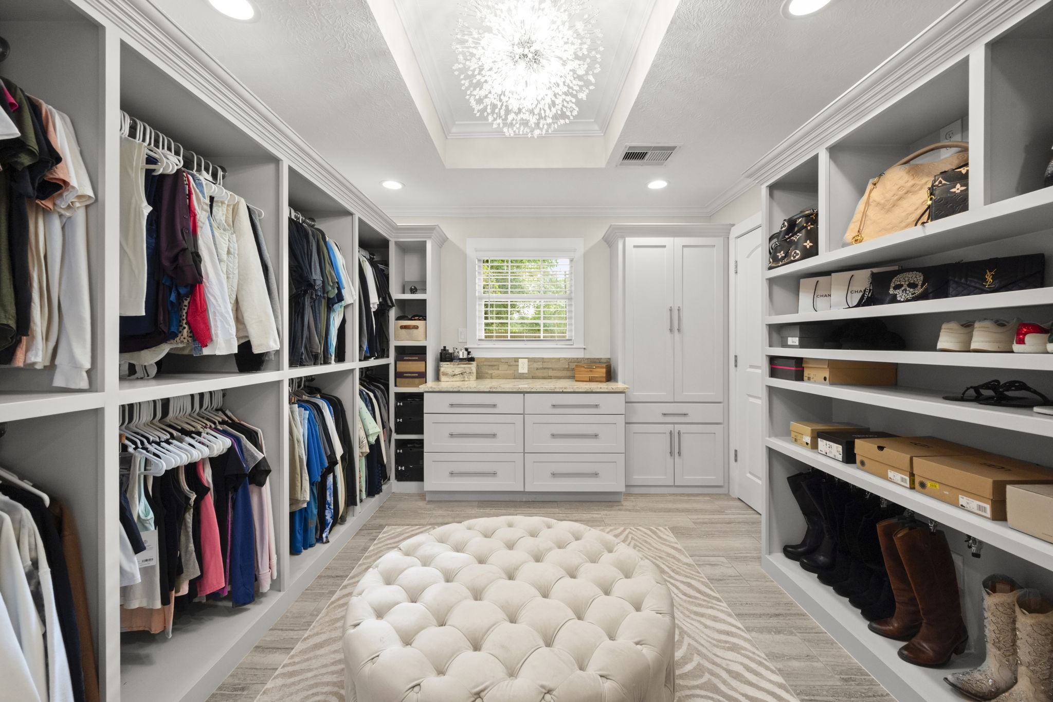 8555 Matthews Lane Magnolia, TX 77354 - Photo 21 of 37 a view of walk in closet with clothes and shoes