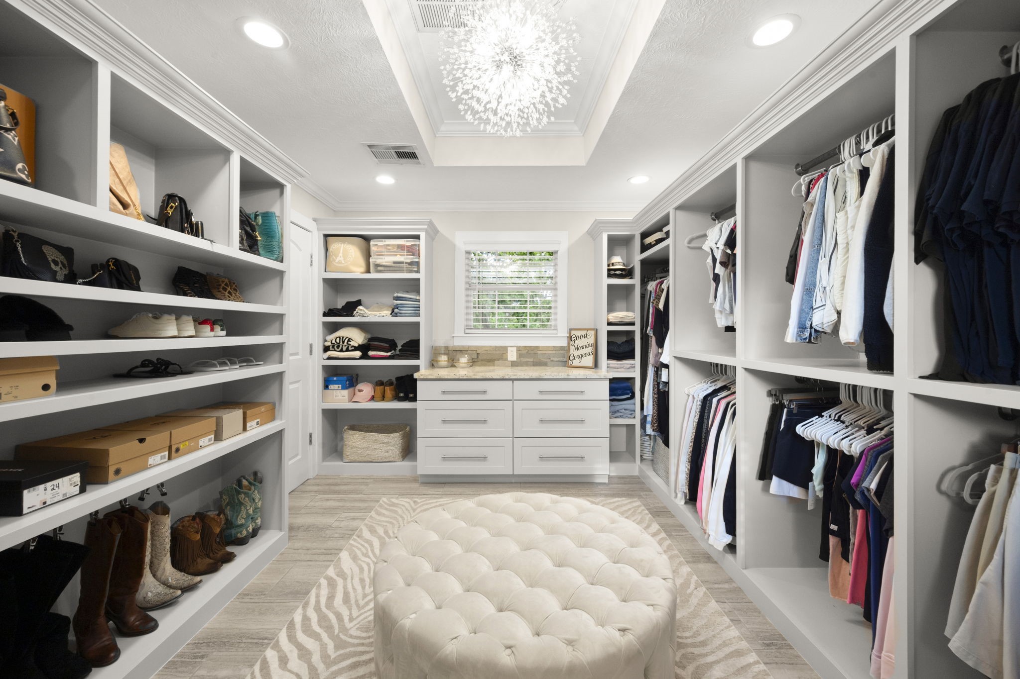 8555 Matthews Lane Magnolia, TX 77354 - Photo 22 of 37 a view of walk in closet with clothes and shoes