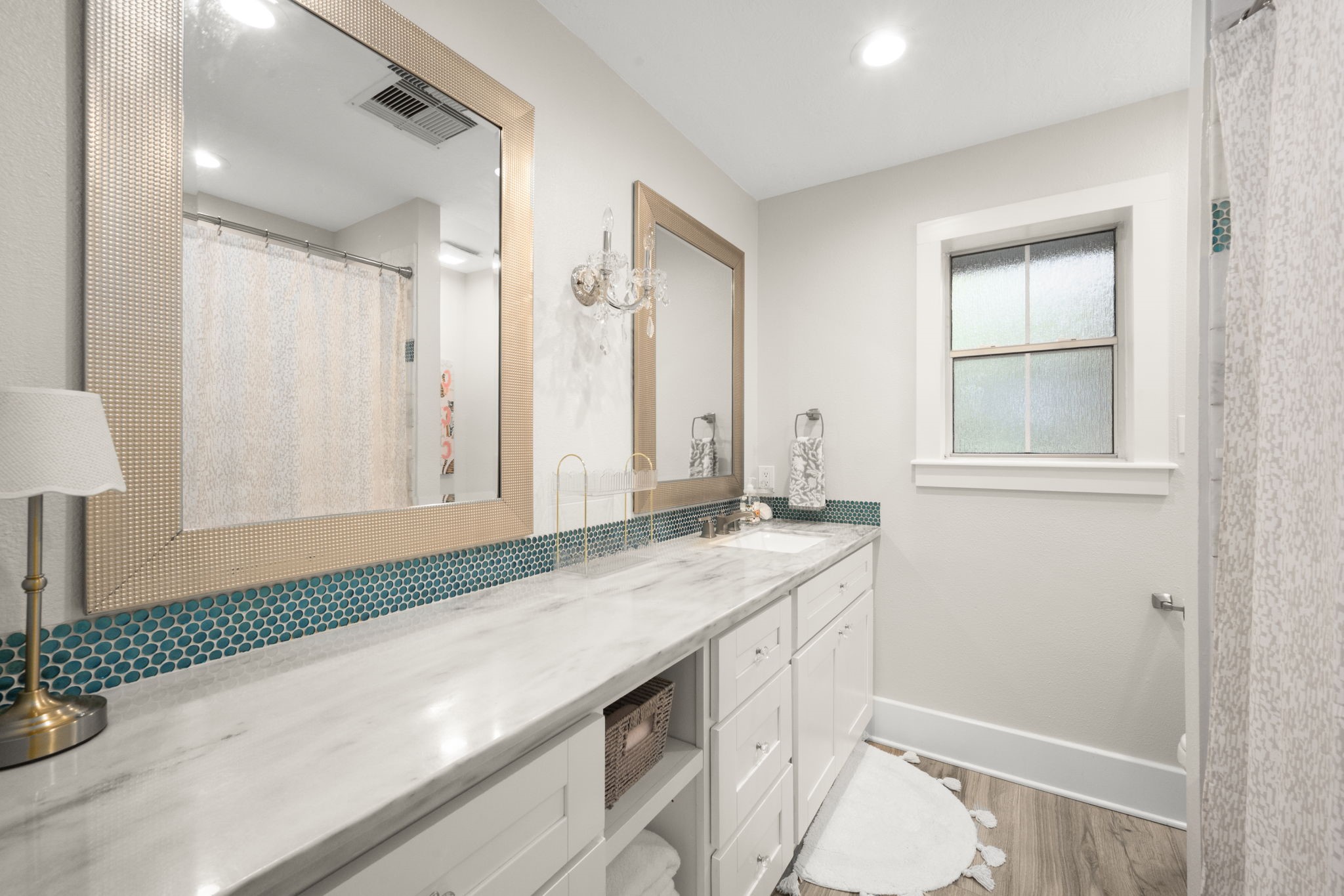 8555 Matthews Lane Magnolia, TX 77354 - Photo 25 of 37 a bathroom with a sink a toilet and a shower