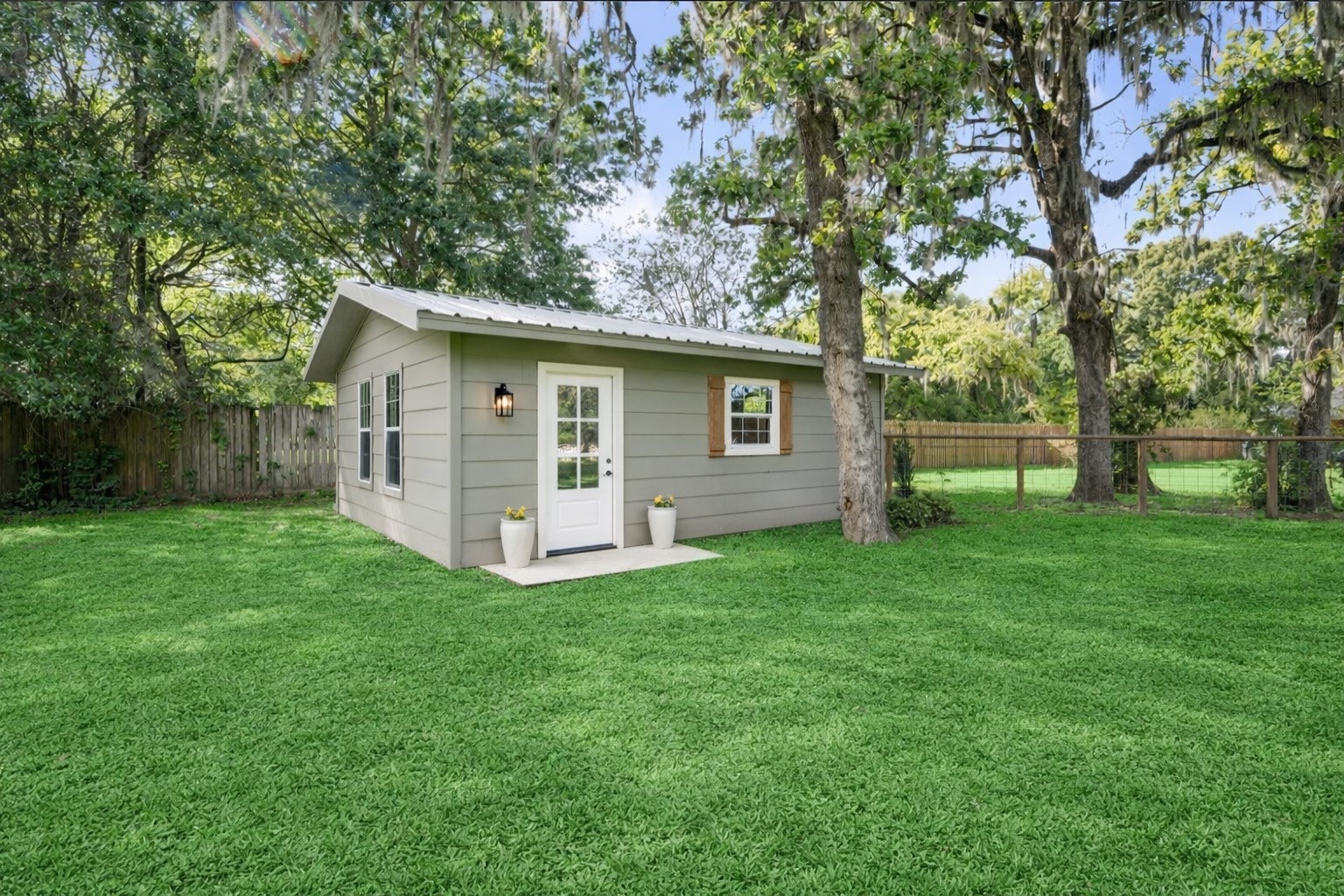8555 Matthews Lane Magnolia, TX 77354 - Photo 35 of 37 a view of a house with backyard and garden