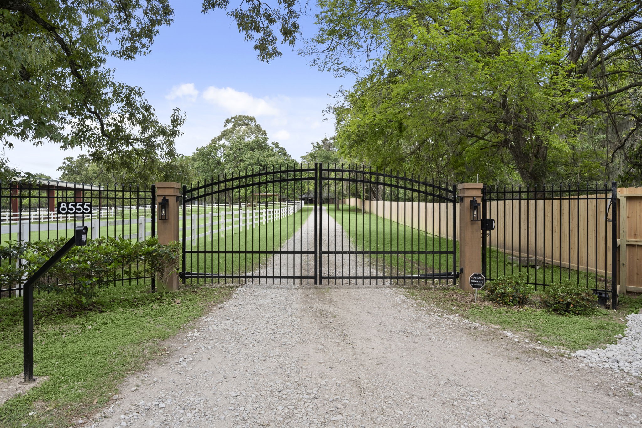 8555 Matthews Lane Magnolia, TX 77354 - Photo 7 of 37 a view of a gate with a fence