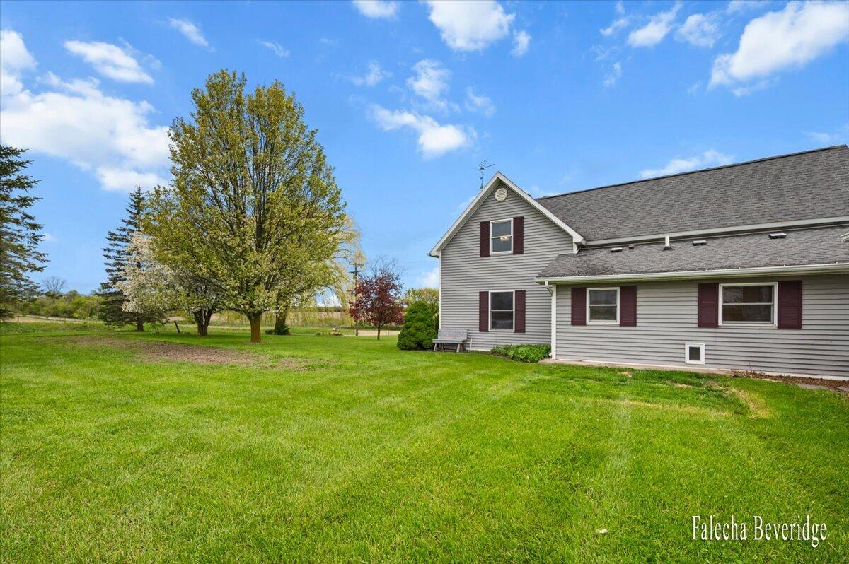 8022 East Vernon Road Clare, MI 48617 - Photo 10 of 44 Rear