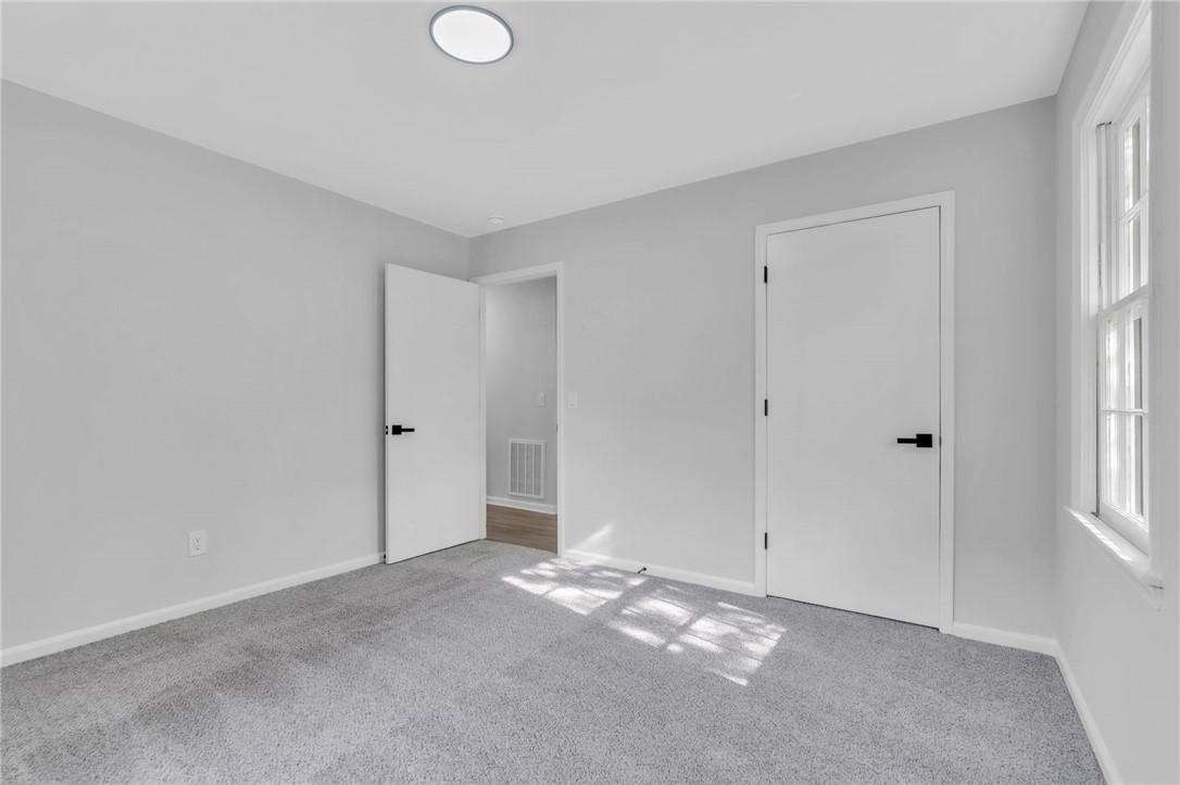 403 Keith Lane Seneca, SC 29678 - Photo 16 of 28 Bright and airy, this bedroom offers a serene retreat with natural light.