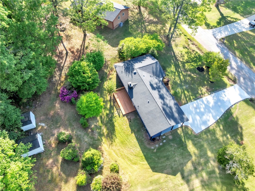 403 Keith Lane Seneca, SC 29678 - Photo 25 of 28 This aerial view showcases a house with an expansive yard, driveway, and mature trees.