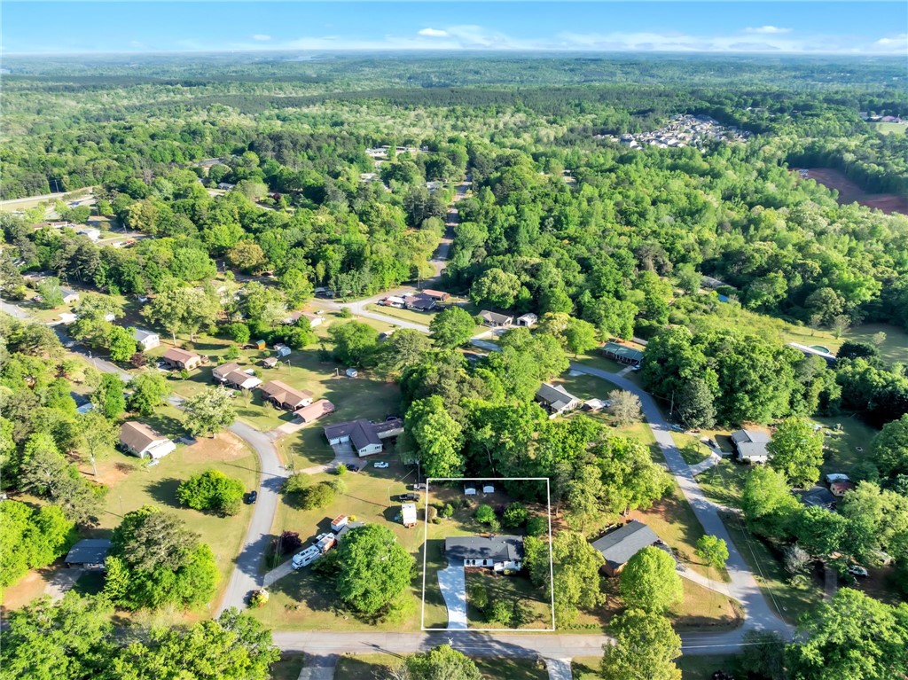 403 Keith Lane Seneca, SC 29678 - Photo 26 of 28 An aerial view captures the suburban landscape with a prominent residential property.