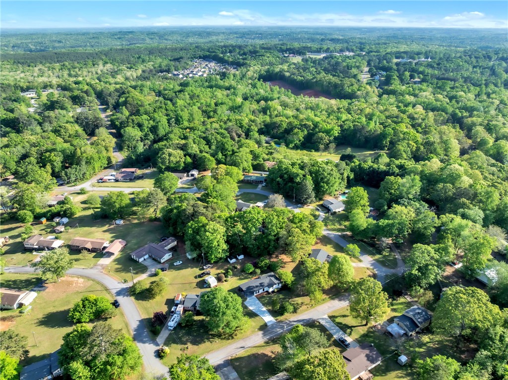 403 Keith Lane Seneca, SC 29678 - Photo 28 of 28 This elevated view captures a serene residential landscape nestled amidst expansive greenery and winding roads.