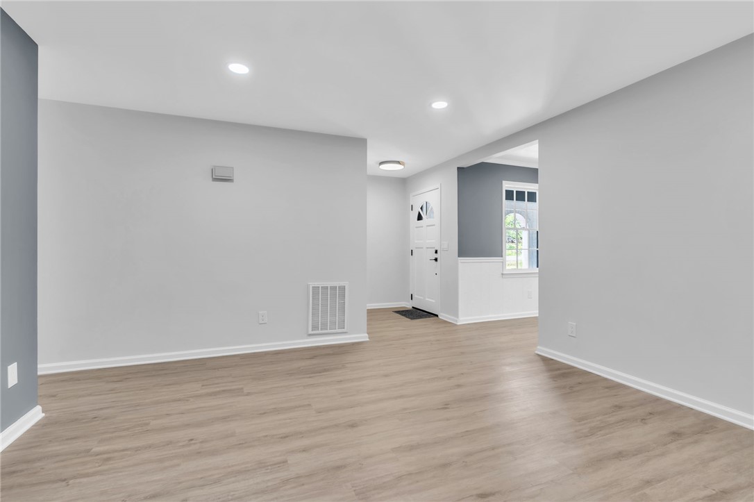 403 Keith Lane Seneca, SC 29678 - Photo 10 of 28 This bright and airy room features sleek flooring, creating a welcoming and modern atmosphere.