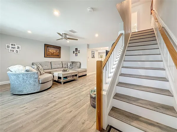 a bedroom with a bed and cabinets