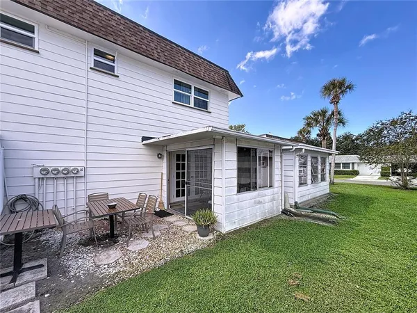 a front view of a house having patio