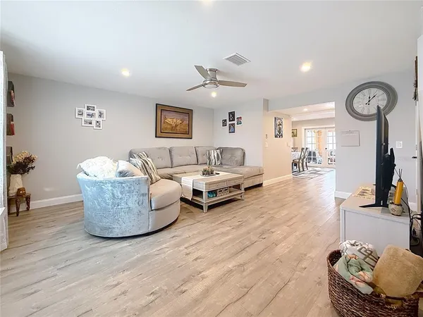 a living room with furniture and a rug