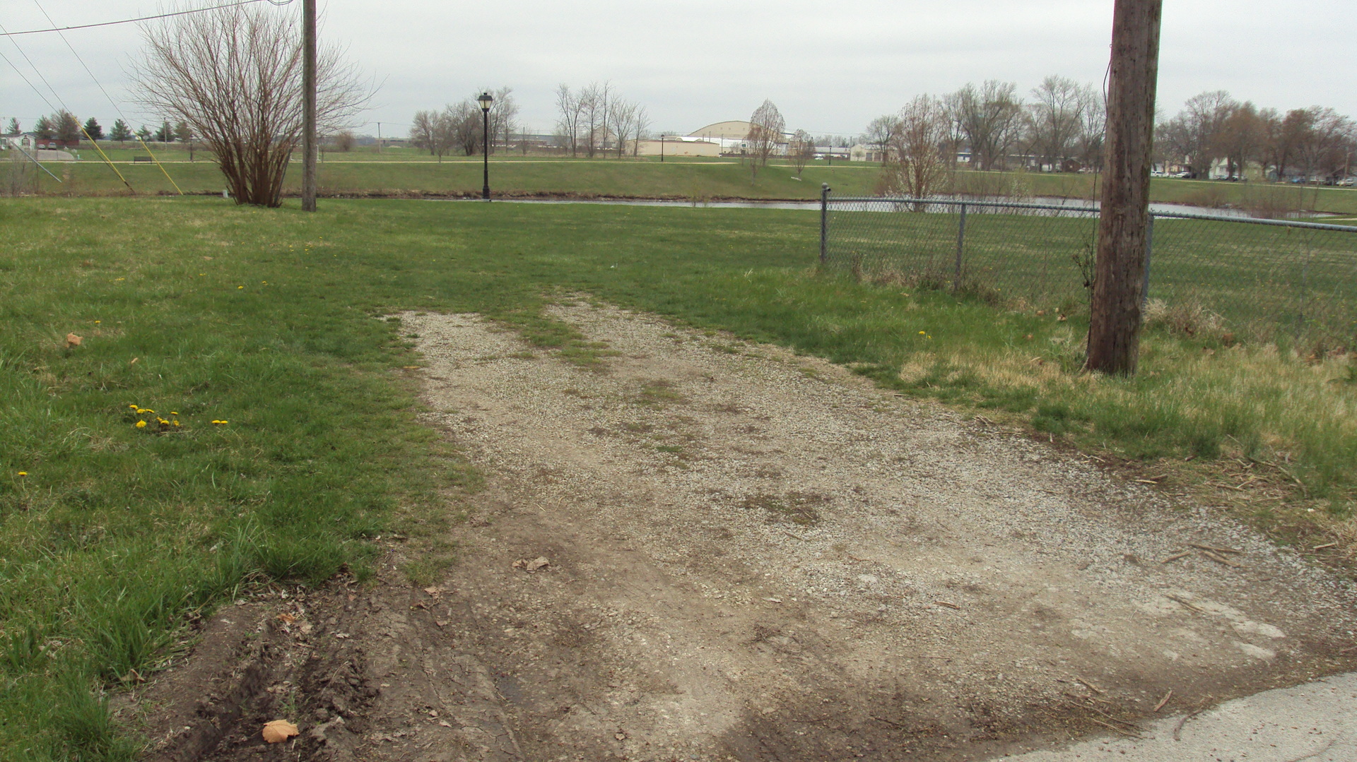 a view of a field with trees