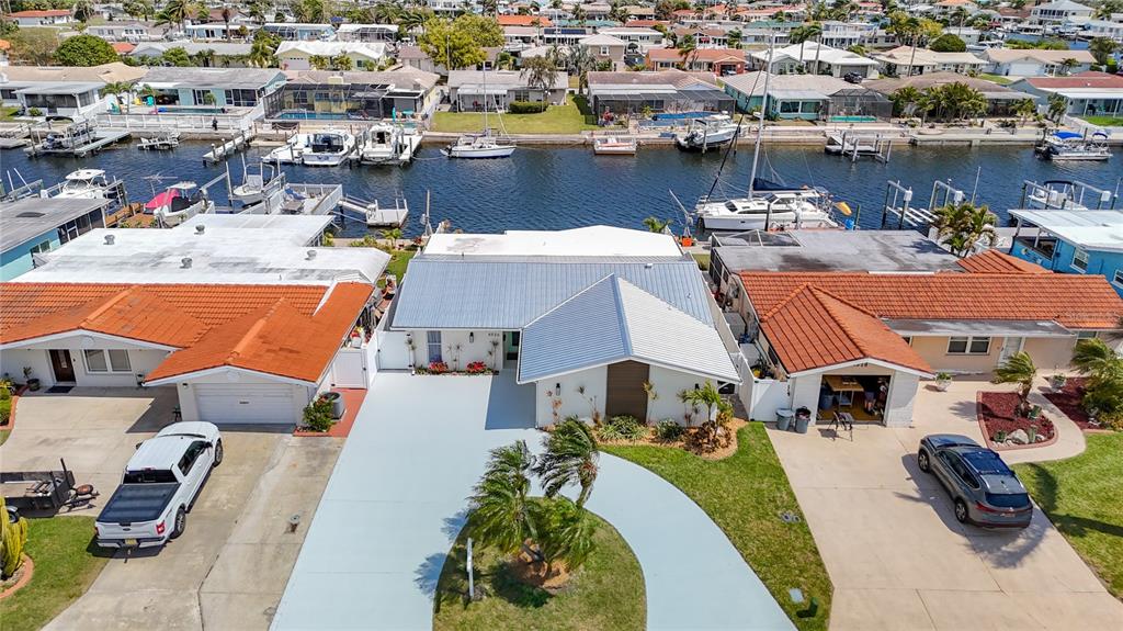 an aerial view of a houses with outdoor space